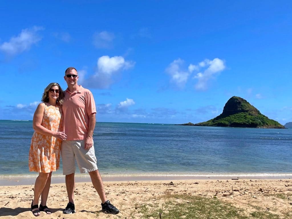 Travel hackers on the beach at Kualoa Park with Mokolii (aka Chinaman's Hat) in the background.