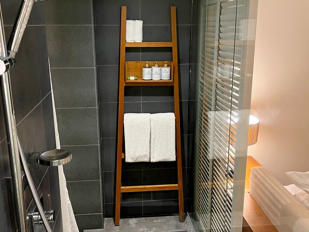 wooden rack inside walkin shower