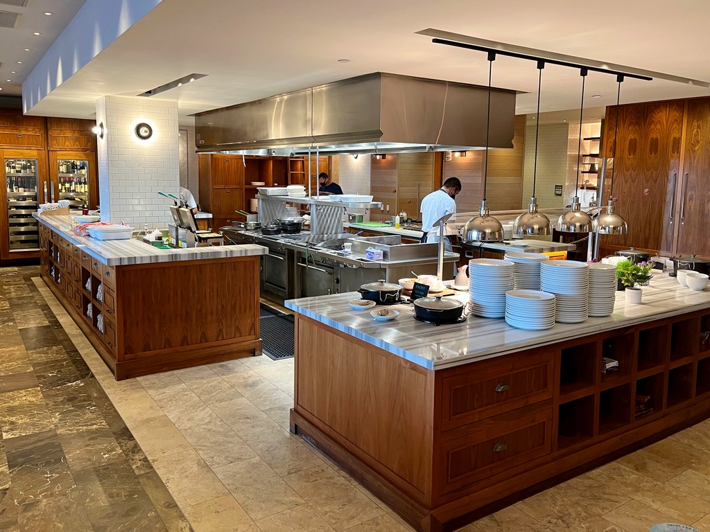 buffet table and chefs at grill in Andaz Maui Ka'ana Kitchen