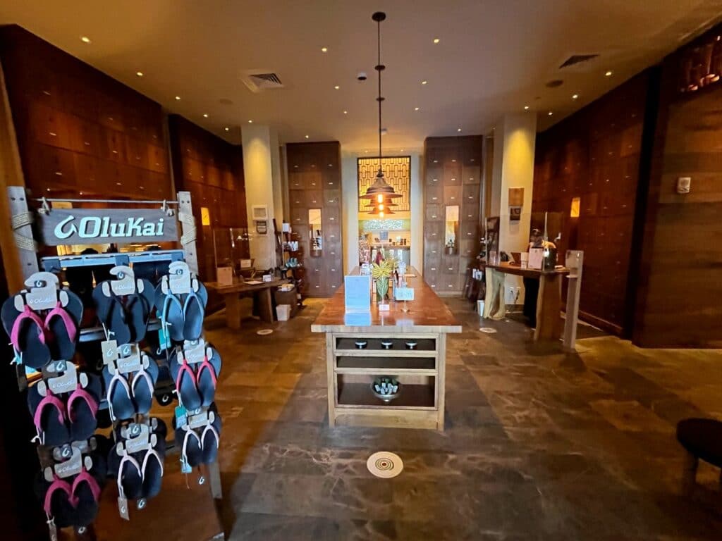 entrance to Awili Spa & Salon with OluKai flip flop display