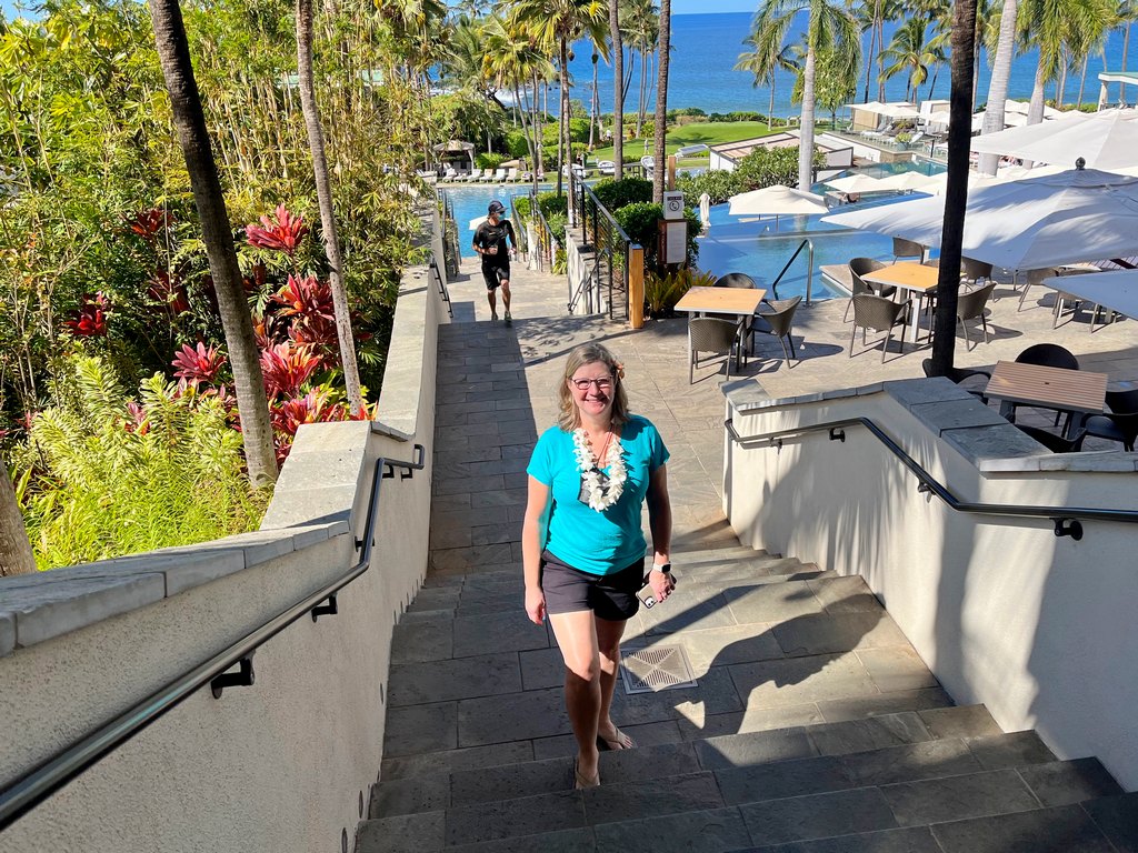 Zuzu in standard resort casual wear on the steps at Andaz Maui