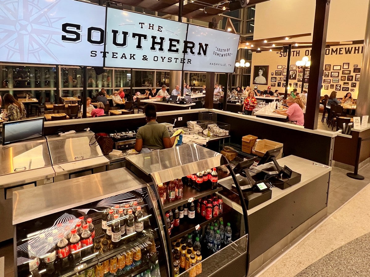 Southern Steak & Oyster in BNA is the best restaurant for upscale dining bu also has grab & go drinks.