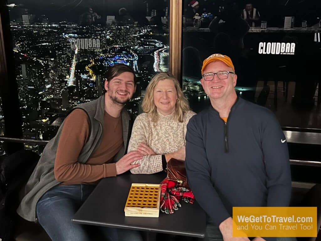 Ross, Sandra and Trent 360 Chicago Observation Deck in the John Hancock Building after dark