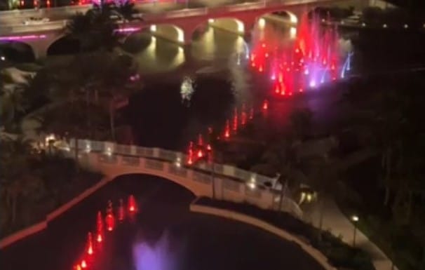 Red lights on the dancing water fountain show as seen from our 16th floor balcony