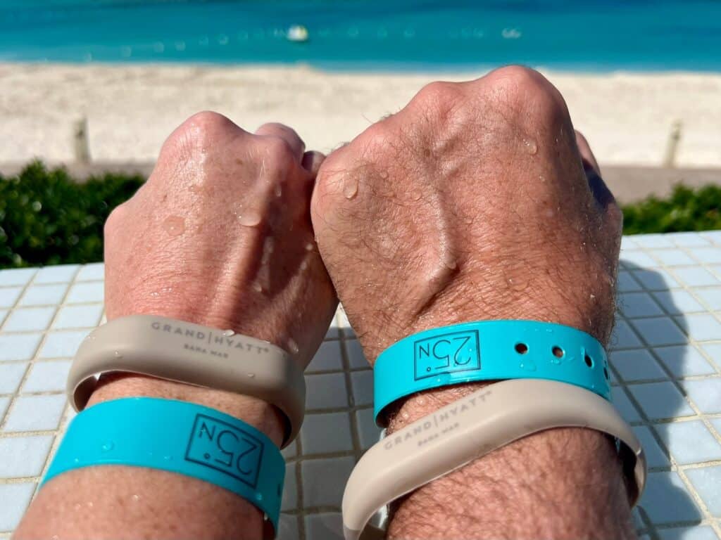 Picture of wrists wearing Grand Hyatt Baha Mar wristbands
