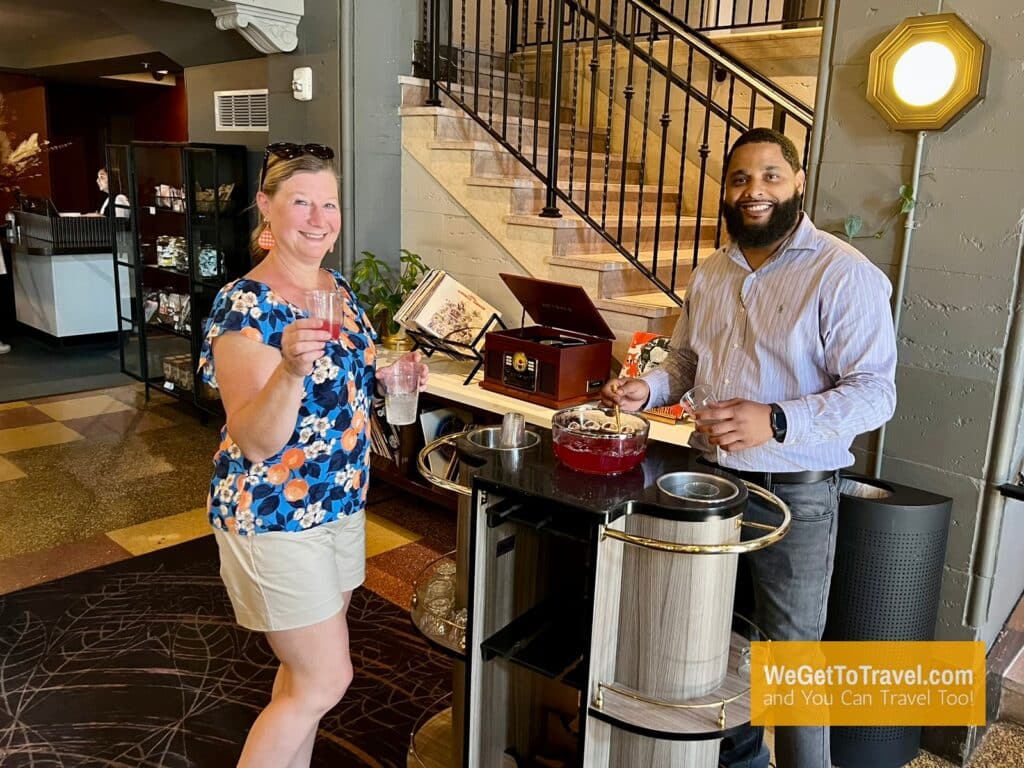 Zuzu having a drink at happy hour in the Holston House lobby