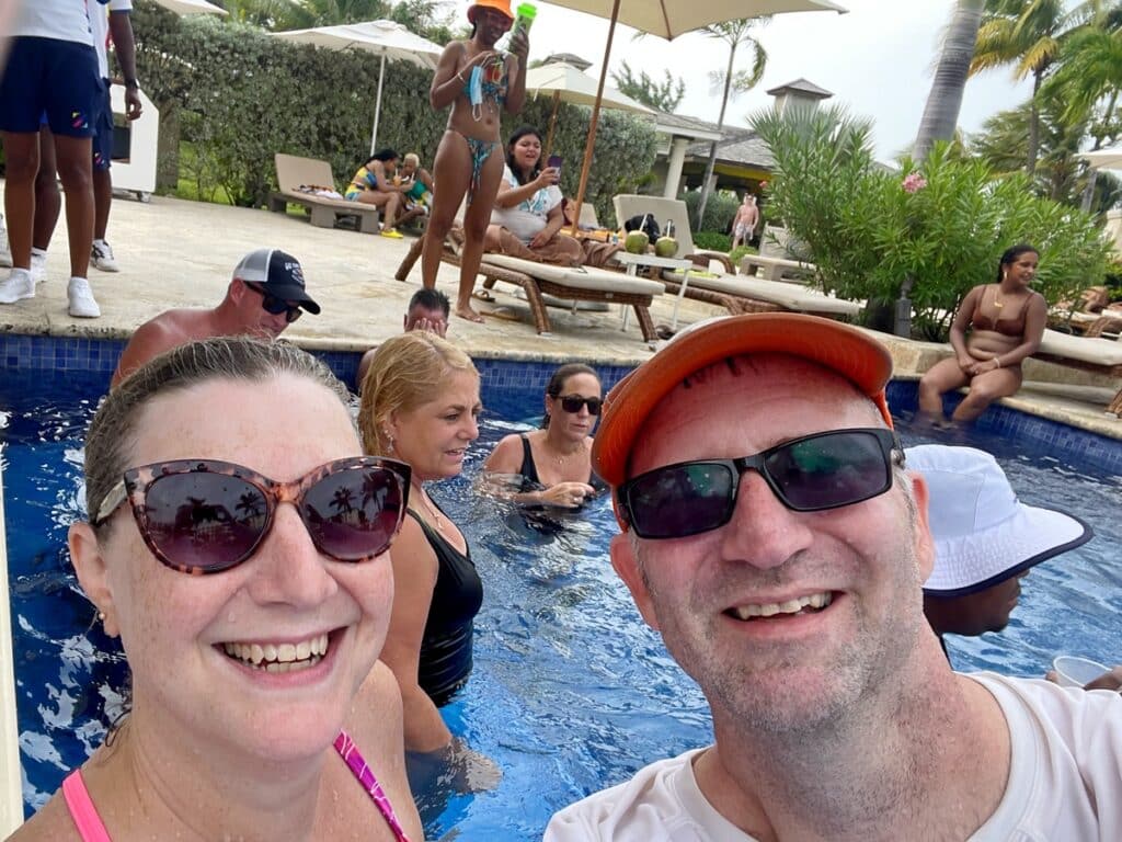 Sandra and Ross at a swim up bar at Zilara Rose Hall All Inclusive Resort in Jamaica