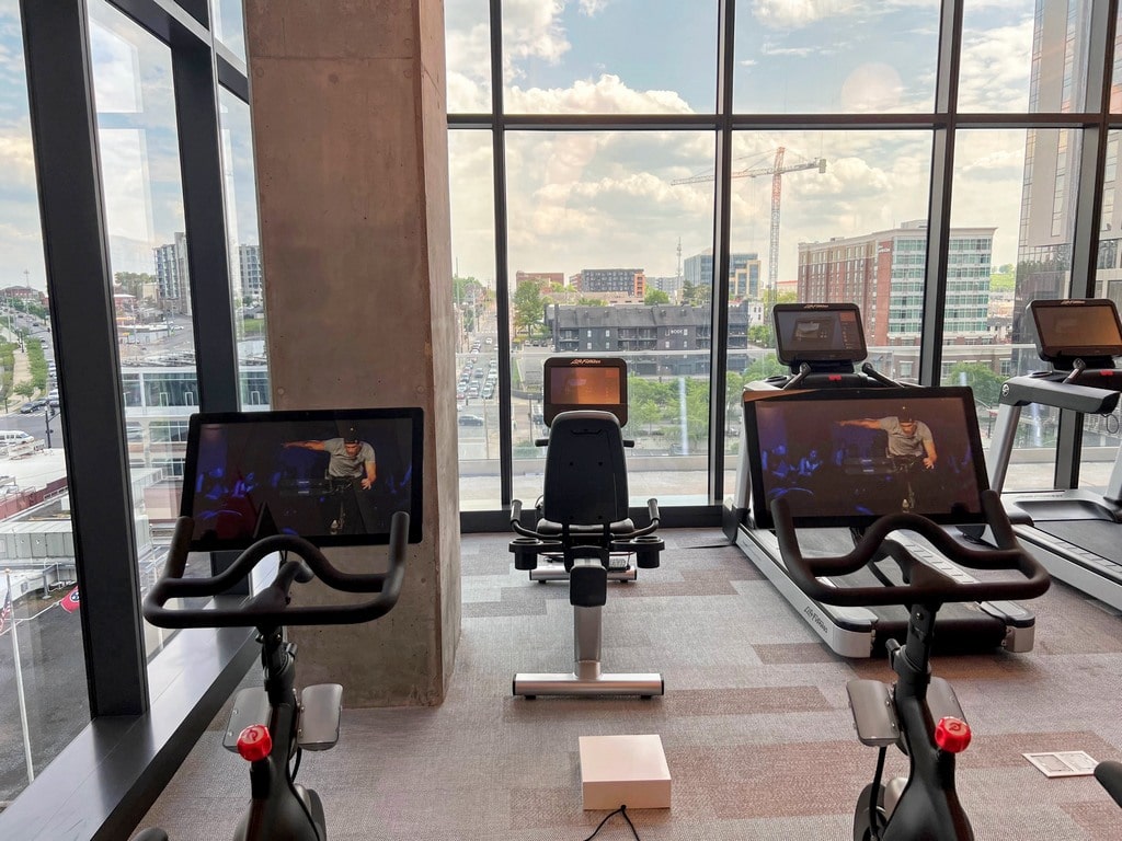 Peloton bikes, treadmills and rowing machines in the Hyatt Centric Nashville fitness center.