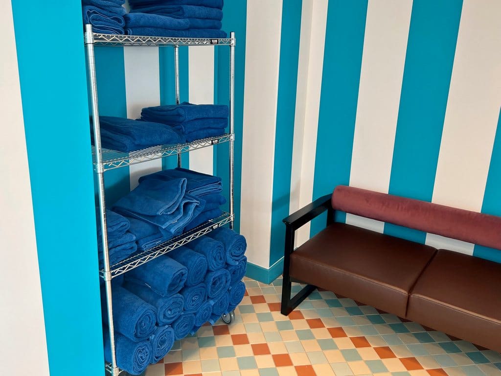 Rack of blue towels for Hyatt Centric pool.