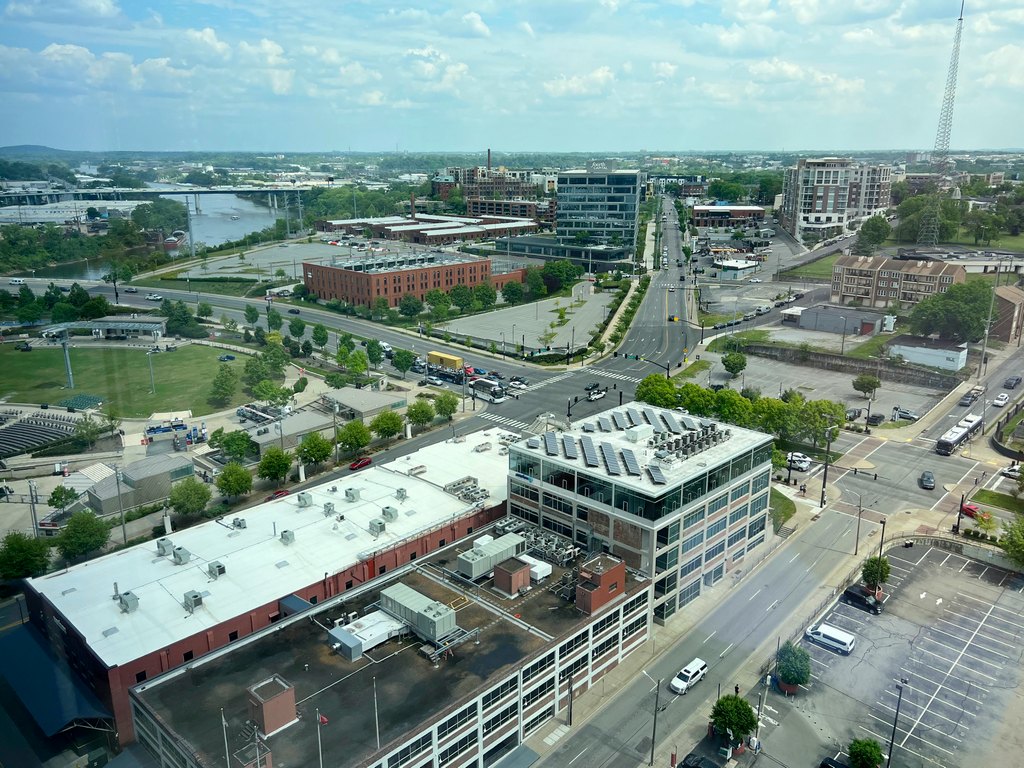 View from 20th floor of Hyatt Centric Downtown Nashville looking southeast toward the Cumberland River, Ascend Amphitheater, and the Nashville Trolley Barns