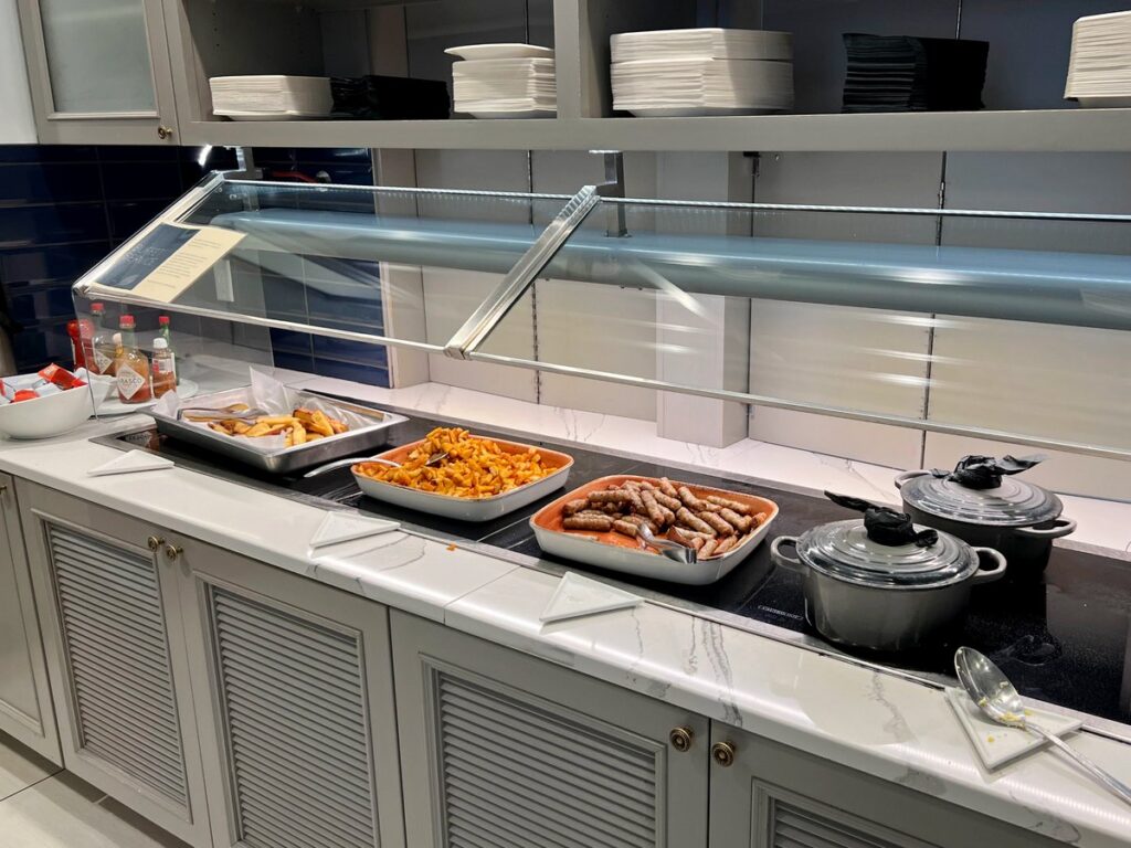 eggs and sausage on breakfast buffet