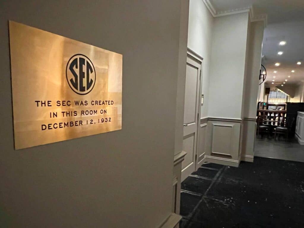 Bronze plaque with words: The SEC was created in this room on December 12, 1932