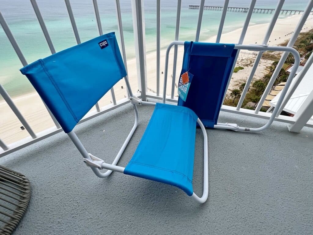 2 blue beach chairs overlooking Panama City Beach