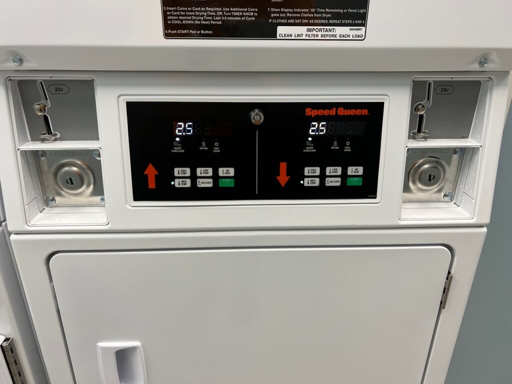 Controls for Stacked washer and dryer in Hyatt Place PCB laundry.