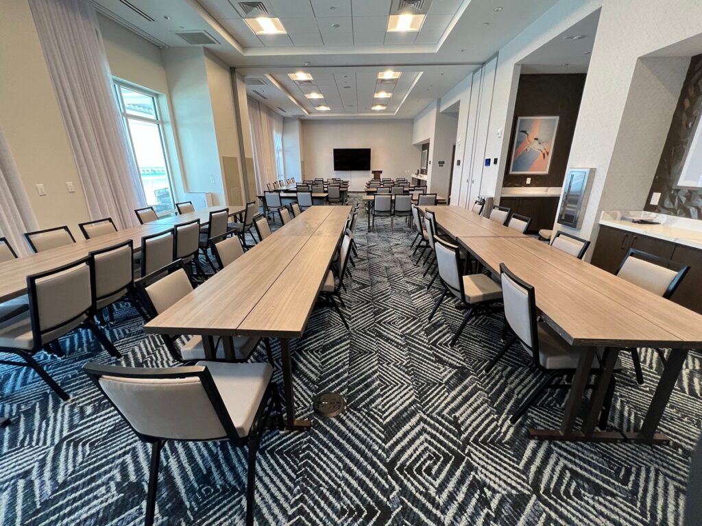 Hyatt Place PCB meeting rooms with tables and chairs
