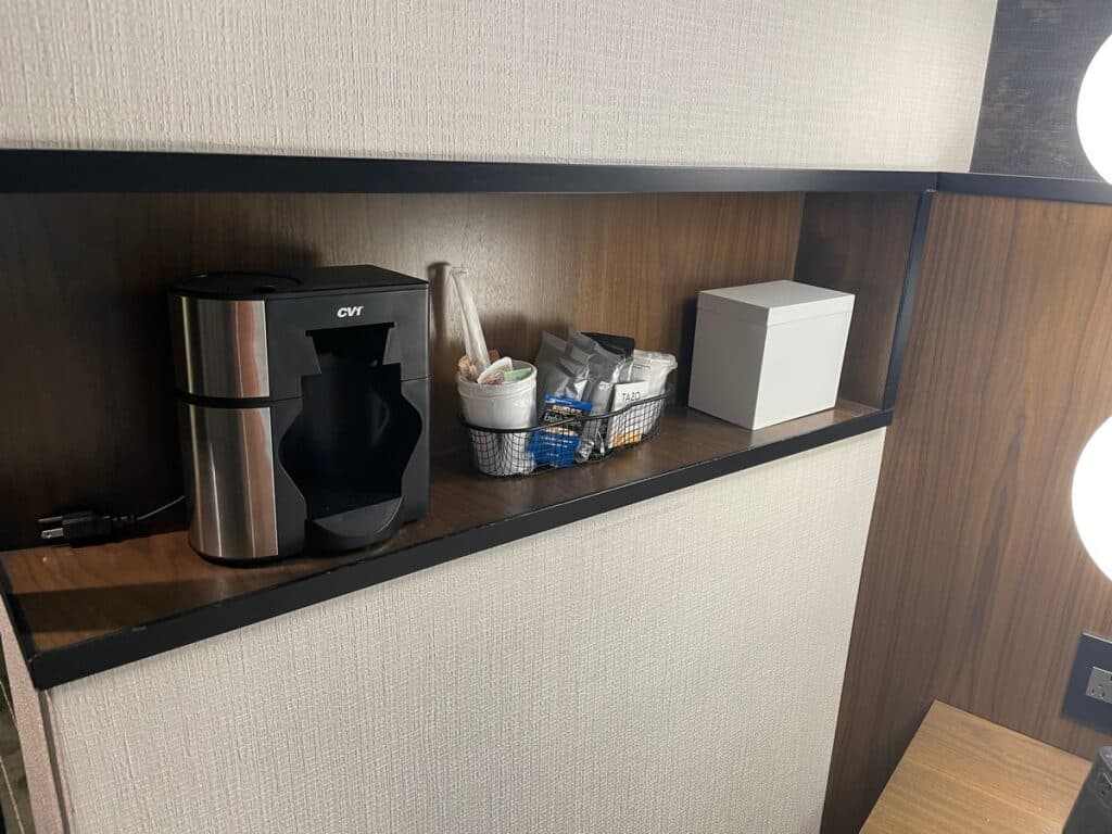 bedside coffeemaker and cups