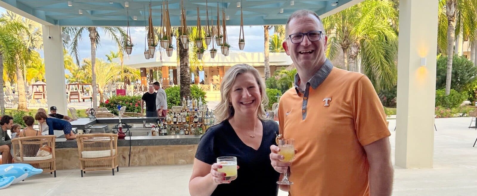 Ross and Zuzu with drinks at the Hyatt Ziva Riviera Cancun All Inclusive resort in Mexico