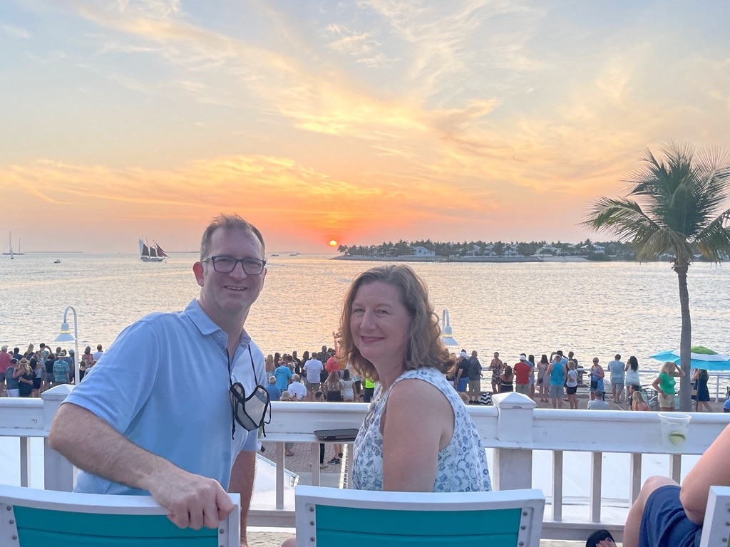Ross and Zuzu watching sunset at Mallory Square in Key West Florida