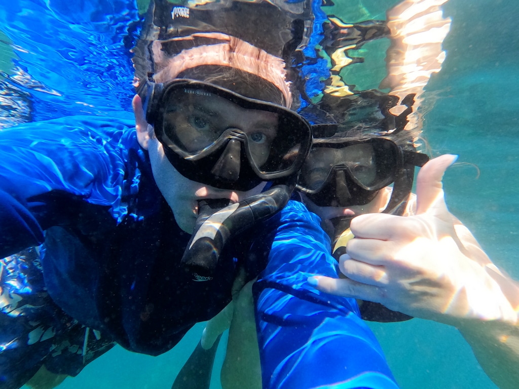 Ross and Zuzu underwater with snorkel gear