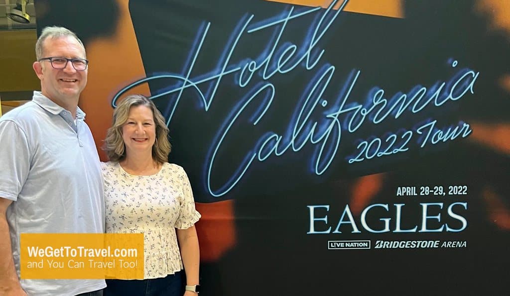 Ross and Zuzu with the Eagles Concert sign at Nashville's Bridgestone Arena