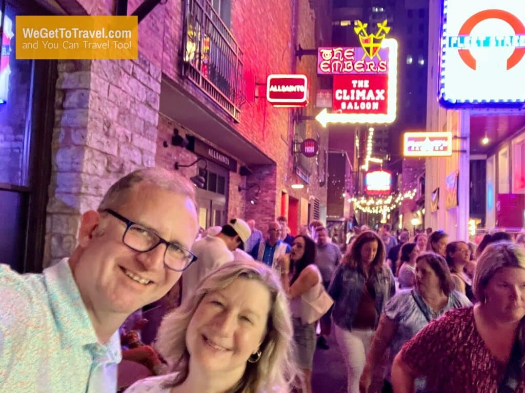 Ross and Zuzu on Printer's Alley at night