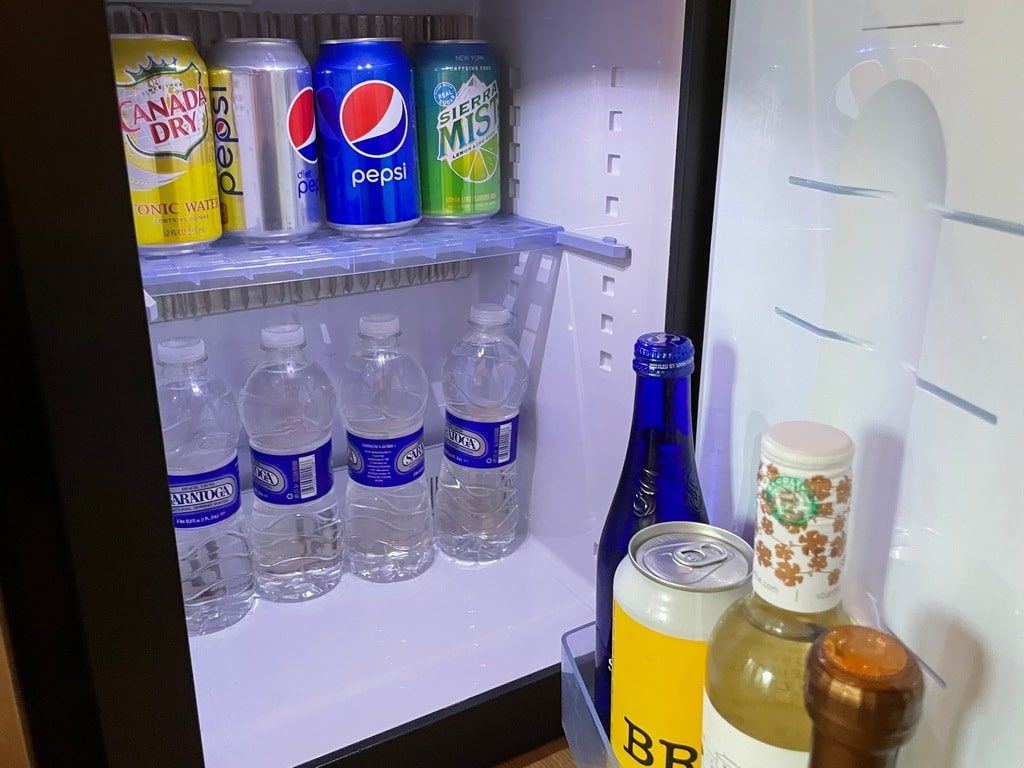 mini refrigerator with water and soda