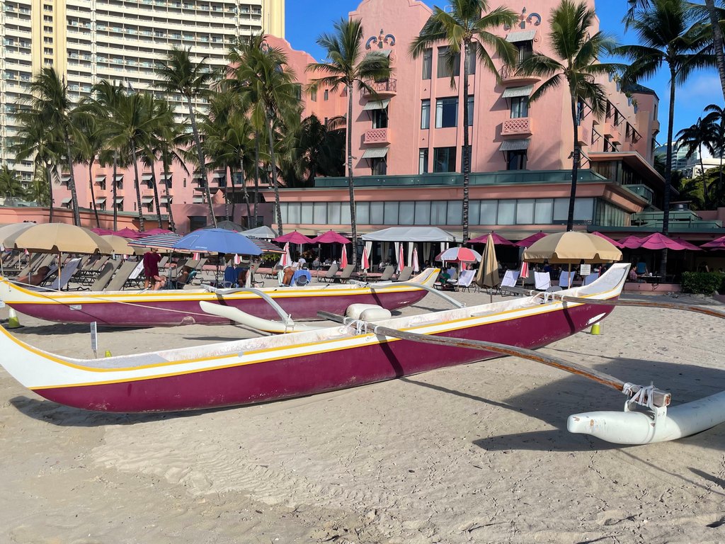 Outrigger canoe in front of The Royal Hawaiian