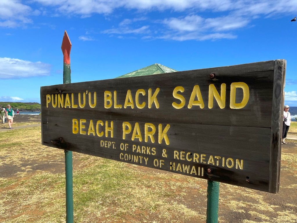 Sign for Panaluu Black Sand Beach Park on Big Island of Hawaii