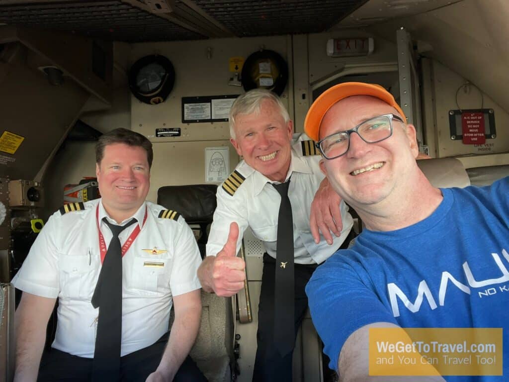 Ross with pilot and copilot in cockpit of 767 on Delta Flight from JFK to Munich