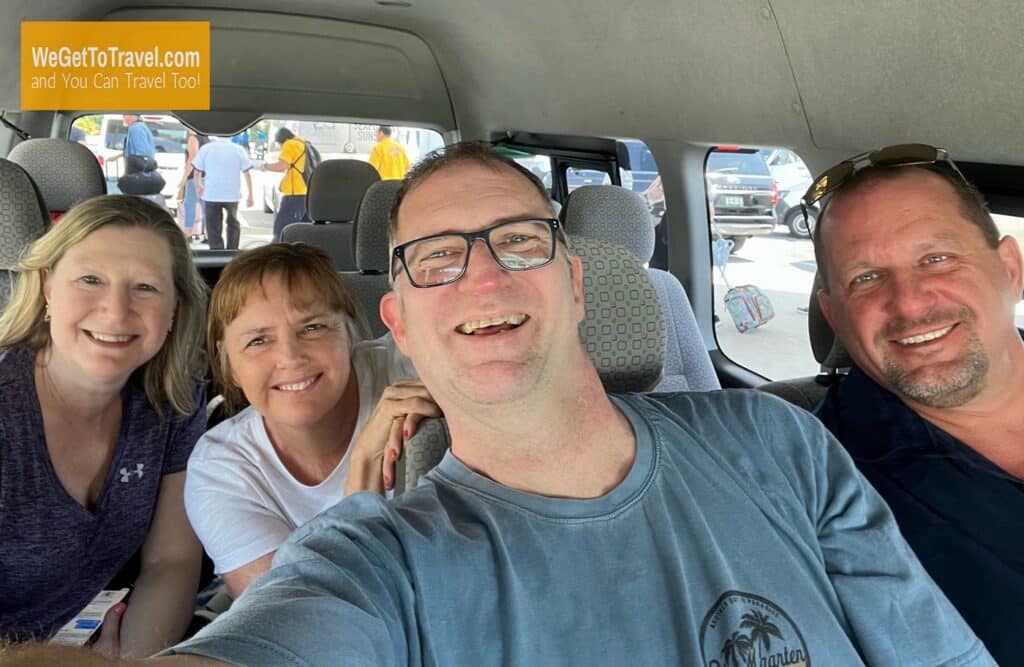 Zuzu, Maggie, Ross and Steve in an airport shuttle van at Cancun airport