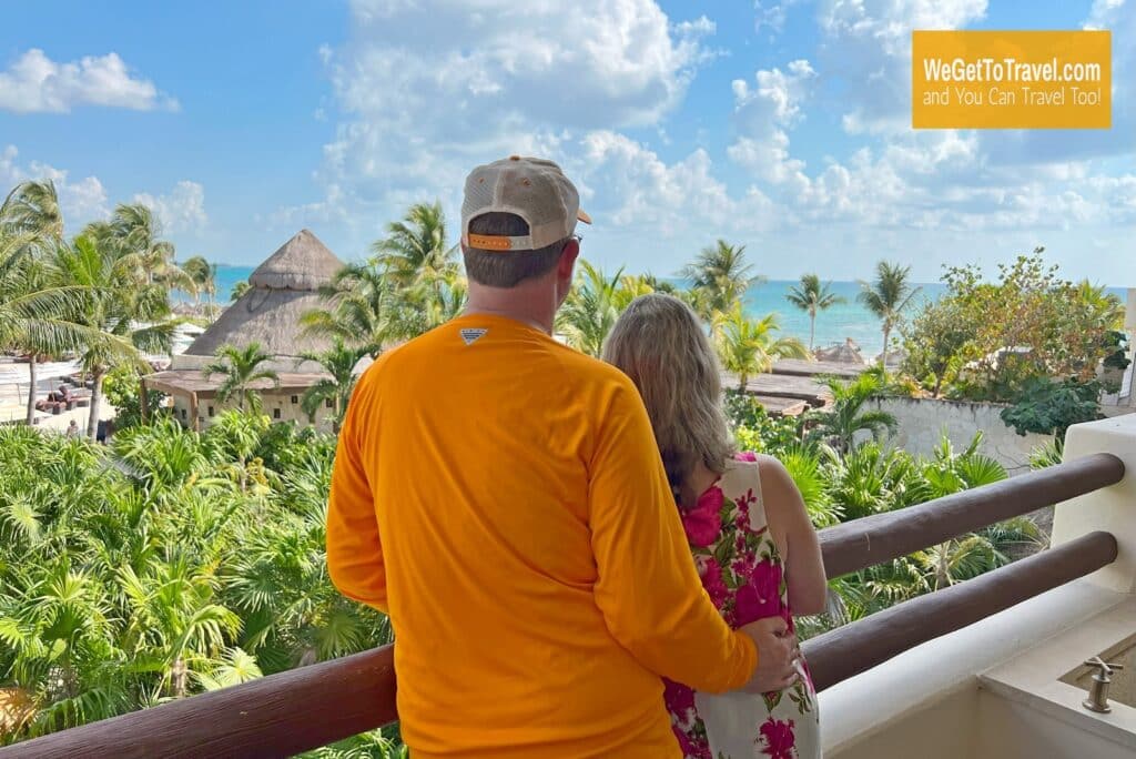 Ross and Zuzu on the balcony at one of our favorite all inclusive resorts: Secrets Maroma Beach