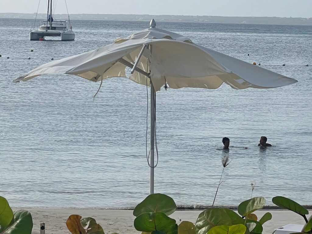 Ripped beach umbrella at Secrets St Martin