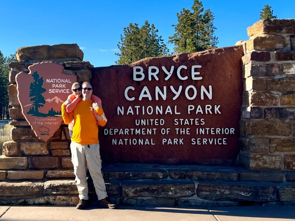 Ross and Zuzu at the Bryce Canyon National Park entrance sign.